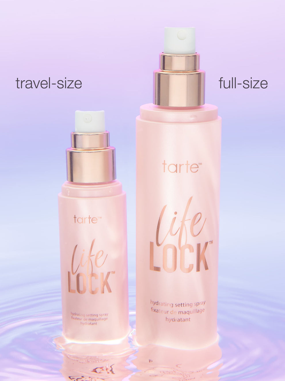 Two pink bottles labeled tarte life LOCK stand upright on rippling water, with text indicating travel-size and full-size. The background has a gradient of pastel colors.