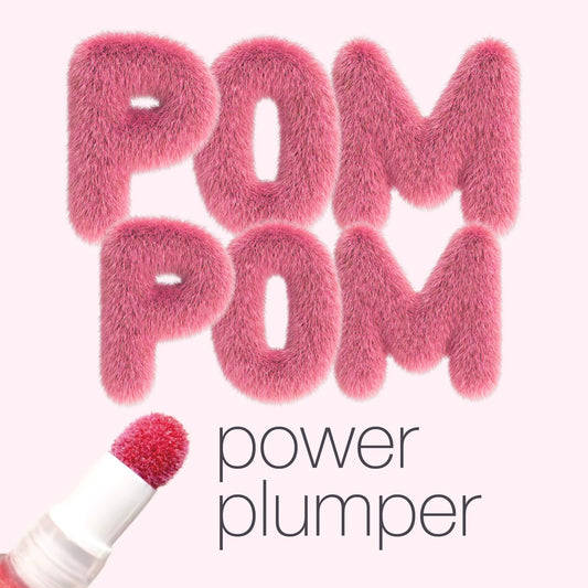 Fluffy pink text reads POM POM above a lip product applicator, with power plumper written below. The background is light pink, emphasizing the cosmetic theme.