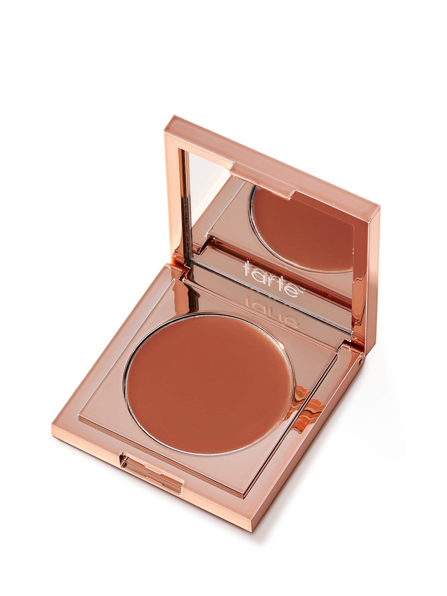 Tarte makeup compact with brown powder on a white background