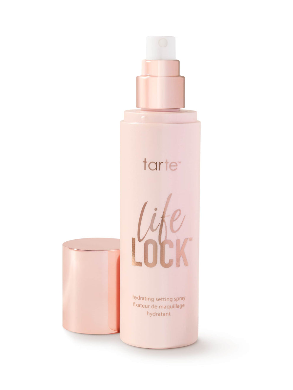 Pink 'tarte life lock' setting spray bottle on a white background
