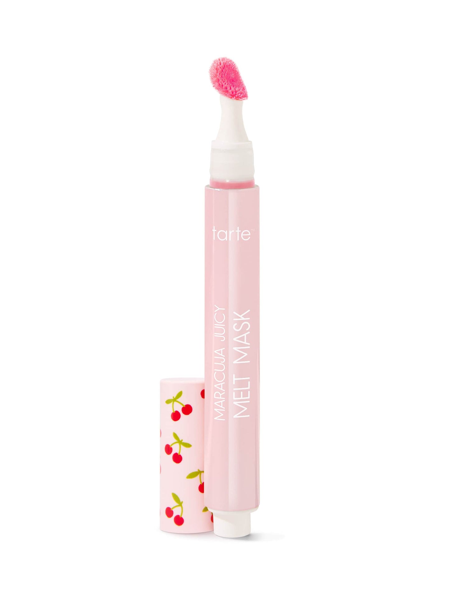 A pink lip treatment pen stands upright with an open cap displaying cherry patterns, labeled Tarte Cosmetics Maracuja Juicy Lip. It's placed against a plain white background.