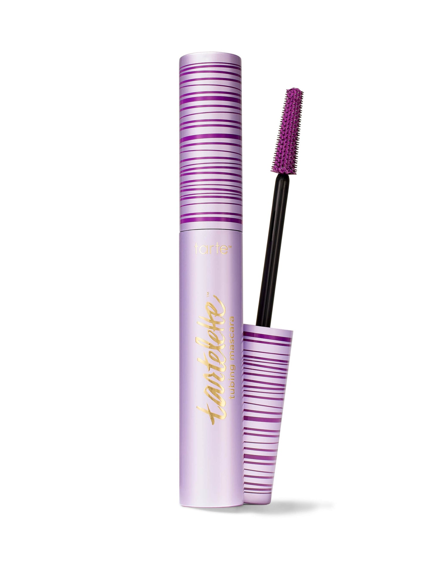 Mascara with purple and white striped packaging on a white background