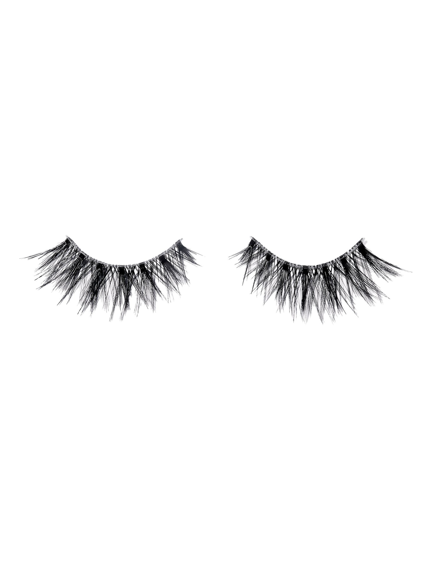 Pair of false eyelashes on a white background
