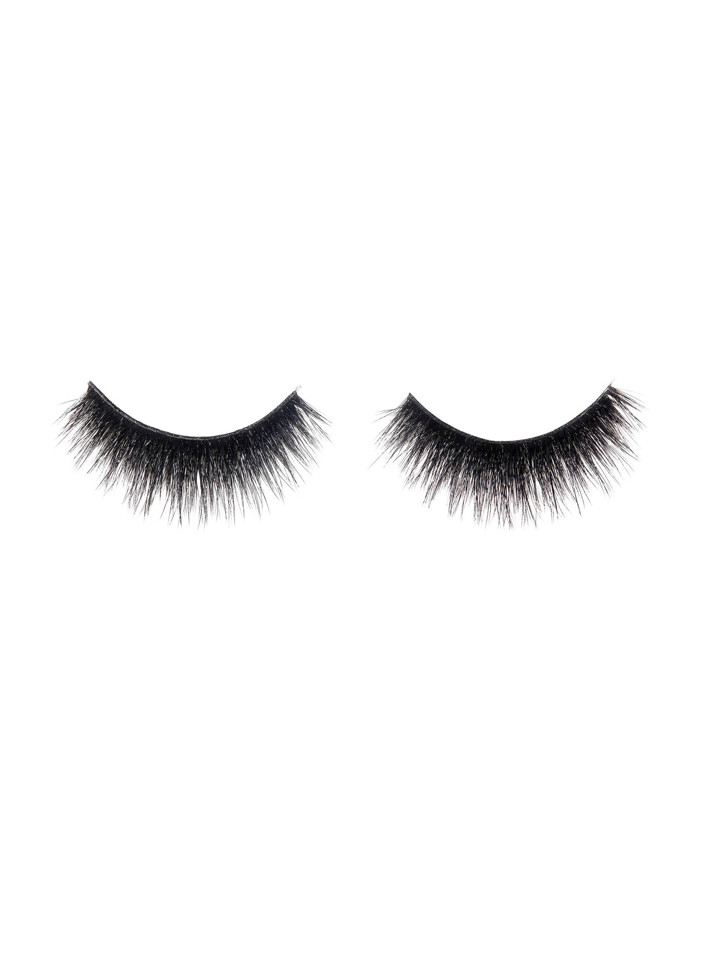 Pair of black false eyelashes on a white background