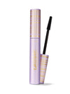 Lavender tarte mascara tube standing upright with its wand removed, the black bristled brush angled outward against a plain white background. Text: tarte; tartelette tubing mascara