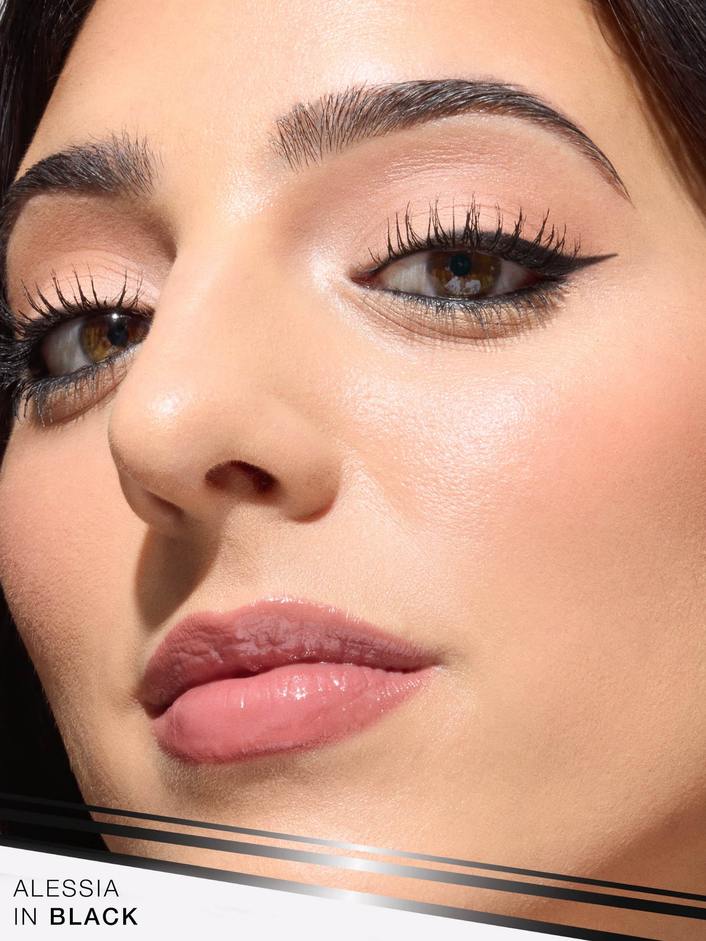 Close-up of a woman's face with makeup application, specifically eyeliner, with 'Alessia in Black' branding.
